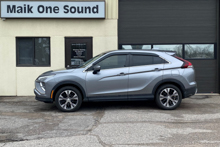 Grey 2025 Mitsubishi Eclipse Cross with dark privacy window tint